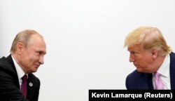 Владимир Путин и Дональд Трамп на саммите "Большой двадцатки" в Осаке 28 июня 2019 года