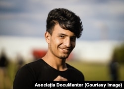 Portret de migrant