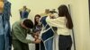 Kosovo: In Peja students are reusing secondhand clothing items 