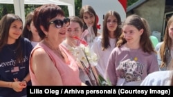 Lilia Olog, la un eveniment organizat de Linia Roșie Italia. Lilia este din orașul Sângerei, a făcut studii la Universitatea de Stat din Moldova, iar apoi - o specializare la Universitatea din Cluj și cursuri de asistență în Italia, în 2008.