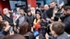 Bașcana autonomiei găgăuze, Evghenia Guțul, întâmpinată pe 8 martie de simpatizanți și jurnaliști la Aeroportul Internațional Chișinău, la revenirea sa de la Soci, unde s-a întâlnit două zile mai devreme cu liderul rus, Vladimir Putin 