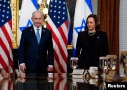 Vicepreședinta SUA Kamala Harris (dreapta) primindu-l la Washington pe premierul israelian Benjamin Netanyahu la 25 iulie 2024.