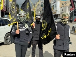 Palestinci na protestima nakon ubistva jednog od lidera Hamasa, Saleha Arourija u Hebronu, Zapadna obala, 3. januar 2024.