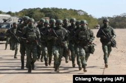 Soldații se antrenează în timpul unui exercițiu militar în nordul Taiwanului, în ianuarie 2021.