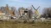 Rămășițele școlii profesionale de la Makiivka, regiunea Donețk, unde potrivit ultimului bilanț al Moscovei 89 de militari ruși au fost uciși în noaptea Anului nou de un atac ucrainean cu rachete HIMARS. 3 ianuarie 2022.