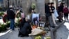 People gather at a memorial dedicated to the events of April 9, 1989, in Tbilisi.