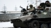 Украински военнослужещи на бронетранспортьор МТ-ЛБ в района на Донецк, 30 януари 2023 г.