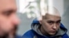 Vadim Șișimarin, de 21 de ani, judecat pentru crime de război, după ce i s-a ordonat să omoare un civil, care ar fi putut să-i alerteze pe locuitorii satului Ciupahivka, din nord-estul Ucrainei, că au intrat invadatorii ruși în satul lor. Băiatul este din Irkuțk/Siberia. 