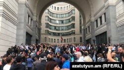 Opposition protesters block the entrances of the building of the Foreign Ministry in Yerevan on May 24.