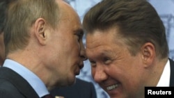 Володимир Путін (ліворуч) і Олексій Міллер, керівник російського газового монополіста «Газпрому»