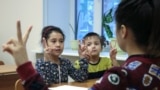 PERM, RUSSIA – DECEMBER 23, 2017: Boys and girls attend classes for children of migrants. Maxim Kimerling/TASS