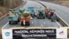 „Macron, răspunde-ne!”, îndeamnă participanții la blocada de pe o autostradă franceză, lângă Paris, la 30 ianuarie. 