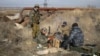 Блок-пост неподалеку от Дебальцево. Украинские военные сообщают, что в районе АТО остаются солдаты со стрелковым оружием