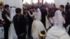 Свадьбы в рамках благотворительной акции Гульнары Каримовой. 