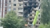 Urmările unui atac rusesc cu drone asupra unui cartier din Kiev. 