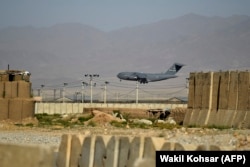 A US Air Force transport plane lands at the Bagram Airfield in July 2021.
