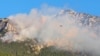 Helikopter Oružanih snaga BiH gasi požar na planini Čvrsnici na jugu BiH, 19. juli 2022.