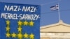 Банер біля грецького парламенту у Афінах, 19 червня 2011 року