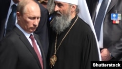 Президент Росії Володимир Путін та митрополит УПЦ (МП) Онуфрій. Архівне фото