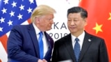 ABŞ-nyň prezidenti Donald Tramp we Hytaýyň başlygy Si Szinpin. Arhiw suraty