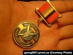 Medalie rusă cu însemnele unității militare GRU Nr. 74455