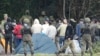 Forțele de securitate poloneze blochează migranții la granița cu Belarus în Usnarz Gorny, 1 septembrie 2021.