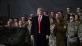 US President Donald Trump speaks to the troops during a surprise Thanksgiving day visit at Bagram airbase in 2019. 