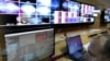 Georgia -- A technician works in the Master Control Room at First Caucasus News TV channel in Tbilisi, 24Jan2011
