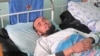 Человек на больничной койке, город Табошар, Таджикистан. Иллюстративное фото. 