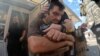 Marketplace Struck By Russian Drone As Volunteers Evacuate Locals1 GRAB