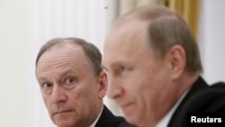 Ресей президенті Владимир Путин және Ресей Қауіпсіздік кеңесінің хатшысы Николай Патрушев.