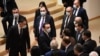 New Prime Minister Irakli Gharibashvili is congratulated by Georgian Dream lawmakers after a confidence vote in his government in a boycotted parliament on February 22.