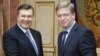Президент України Віктор Янукович і єврокомісар Штефан Філе, Київ, 12 грудня 2011 року