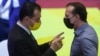 Ludovic Orban s-a opus vehement formării unui guvern PNL - PSD, fiind amenințat cu excluderea din partid. Imagine cu Ludovic Orban (stânga) și Florin Cîțu (dreapta).