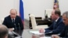 Владимир Путин во время совещания с членами Совета Безопасности РФ. 10 августа 2018 