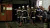 Горняки у входа в шахту имени Костенко в Карагандинской области.