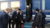 Iranian President Hassan Rohani (C) at the Ak Yayla train station on the Turkmenistan border, December 2014.