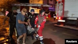Urmările unui atac rusesc cu dronă în Harkov, 11 iunie 2025.